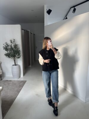 Veste sans manches boutonnées noir, détails poches plaqués