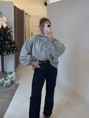 Blouse à carreaux noir et blanc