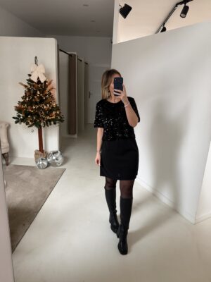 Robe à paillettes noire, détail dos nu