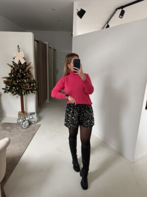 Pull col roulé rose en laine et cachemire