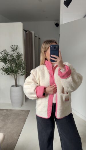 Veste molletonnée réversible coté rose fluo déperlant