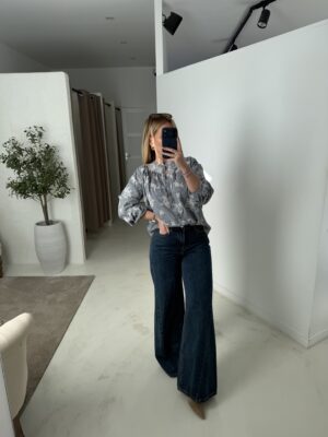 Blouse à carreaux bleu marine et blanc, avec broderies